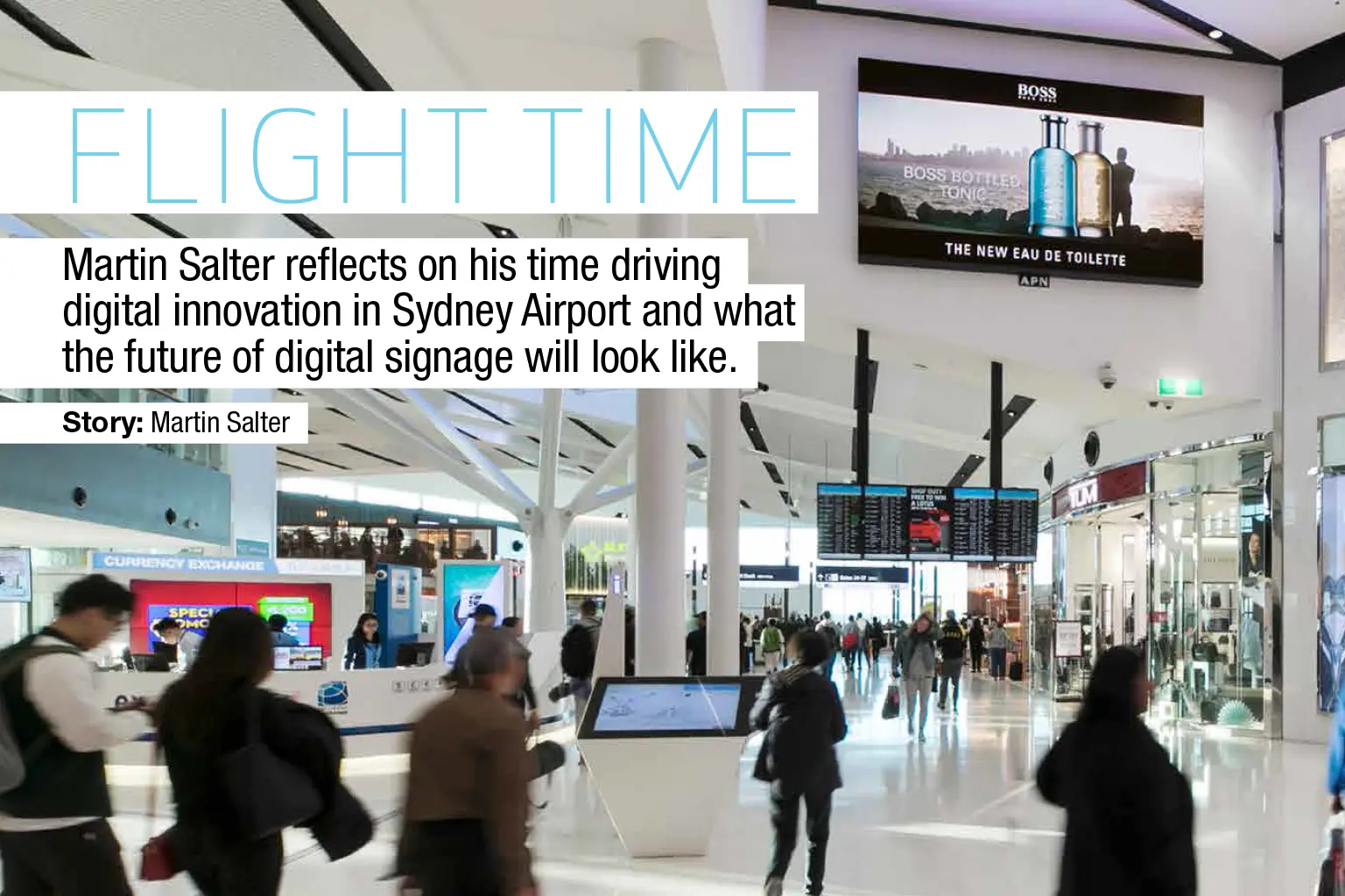 Travellers moving through a modern airport terminal with integrated digital signage and retail displays