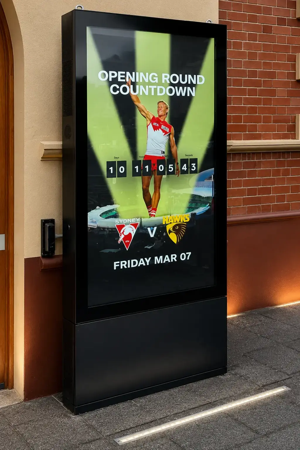 Digital advertising totem displaying sports event countdown promotion